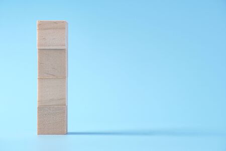 4 blank wood cube mock up in vertical shape on isolated background for create letter or symbol, business, banner, advertising concept, copy spaceの写真素材