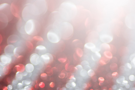 Red and Silver white glittering Christmas lights. Blurred abstract backgroundの写真素材