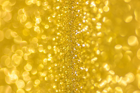 Abstract golden defocused backgroundの写真素材