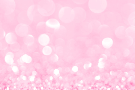 Pink glittering Christmas lights. Blurred abstract backgroundの写真素材