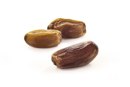 brown dates for ramadan over white background