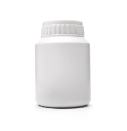 white blank plastic bottle over white backgroundの写真素材