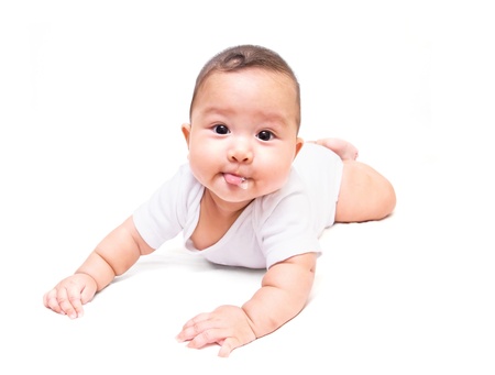 asian baby crawling on white backgroundの写真素材