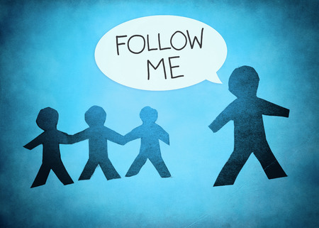 human symbol say "follow me" on blue texture backgroundの写真素材