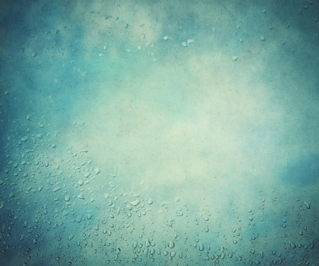 water drop and vintage sky backgroundの写真素材
