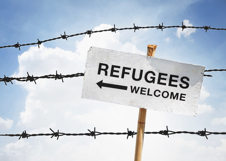 refugees welcome sign and barbwire backgroundの写真素材