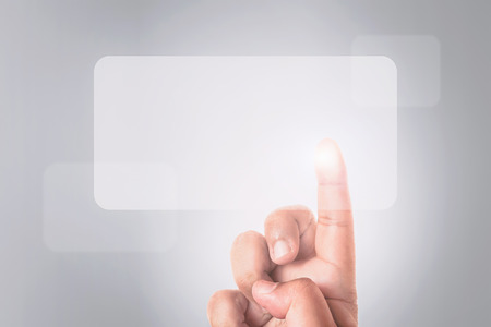 hand pressing screen button with gray background