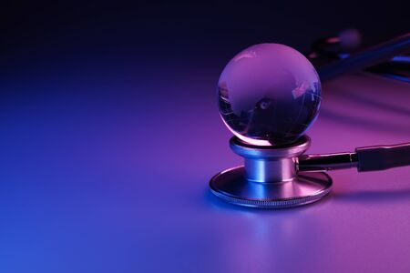 stethoscope and the globe on dark blue pink background. global healthcare or saving earth concept
