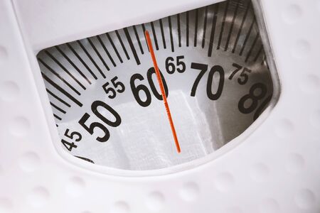 close up analog weight scale