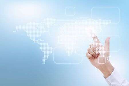 businessman touching world map on digital screenの写真素材