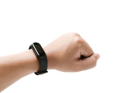 watching the activity on the fitness tracker. smart device healthy lifestyle on the wrist over white background.の写真素材