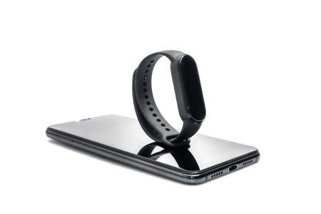 fitness tracker and mobile phone. smart device for healthy lifestyle on white background.