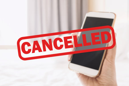 Travelers cancelled hotel booking and resort after a new wave of COVID-19 pandemic. Lockdown order affects tourism and the economy of business travel. Trips canceled and will pay refunds to customers.の写真素材