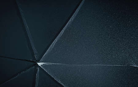 cracked frosted glass. broken window texture background. damaged pane. backdrop for house repair...