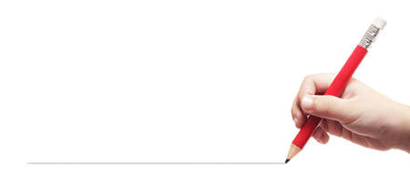 Child's hand holding a red pencil and drawing a straight line on a white background. Learning and education concept. Space to enter text.の写真素材