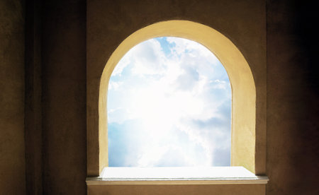 Sunlight through the arch window. Old historic building wall background. Ancient frame architecture. Looking at the sky from the medieval castle.の写真素材