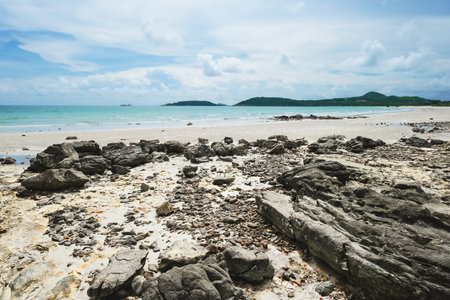 Tropical sea tourism. Landscape of sandy beach in Thailand. Rocky shore ecosystem.の写真素材
