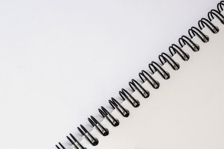 Blank spiral notebook with copy space for text background. Reminder diary. Empty paper page.の写真素材