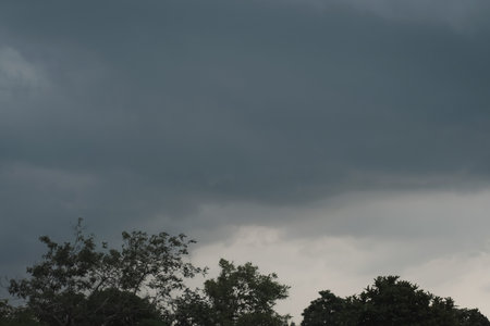 Dark cloudscape sky before heavy rain, nature background showing moody atmosphere and dramatic...