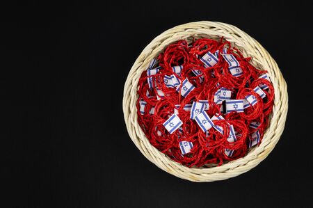 Red thread on a black background in the cartの写真素材