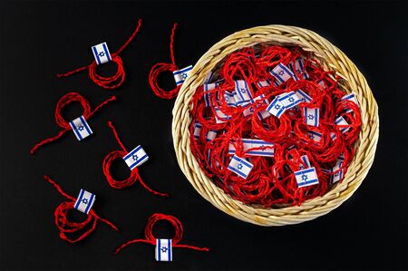 Red thread on a black background in the cart