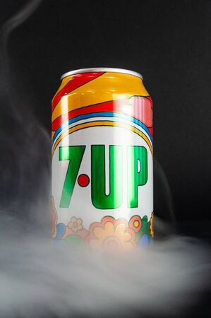 Omsk, Russia - November 27, 2019: Image of a can of carbonated drink 7 Up on a dark background