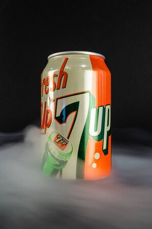 Omsk, Russia - November 27, 2019: Image of a can of carbonated drink 7 Up on a dark background