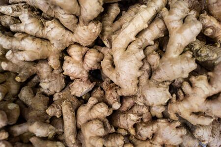A lot of ginger roots are in the shopping cart