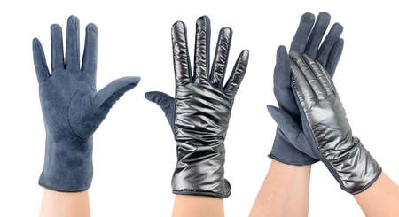 Gloves worn on the girl's hand. Isolated image on white backgroundの写真素材