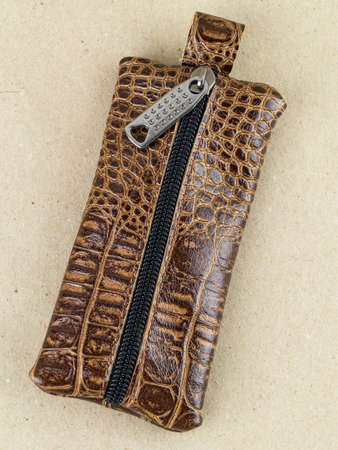 A beautiful and stylish key holder lies on a paper background. close-up photoの写真素材