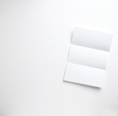 a blank folded letter on a white backgroundの写真素材