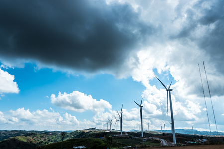 Wind turbine farm on the mountain with blue sky