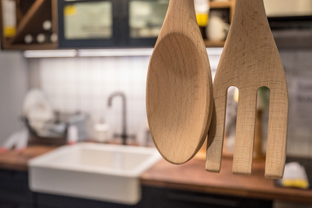 Close up wooden utensils with blurred vintage kitchen. Cooking concept with copy space.の写真素材