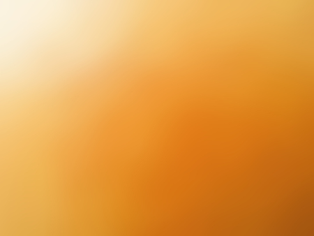 Abstract gradient orange white colored blurred background.の写真素材