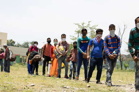 Dehradun, Uttarakhand/India - September 06 2020:Migrant people coming from difrent states due to corona pandemic.のeditorial素材