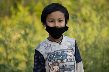 Dehradun, Uttarakhand/India - September 06 2020: Smart boy wearing face mask.のeditorial素材