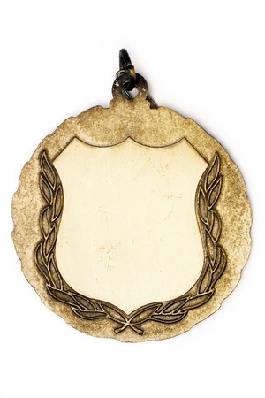 Blank gold medal isolated on a white background.の写真素材