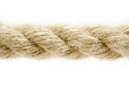 Macro shot of a twisted rope isolated on a white background.