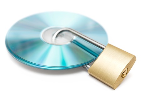 Locked CDs isolated on a white background.の写真素材