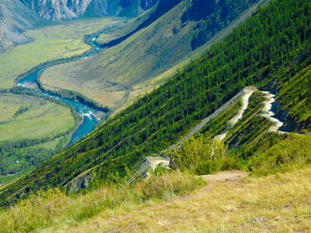 Landscape with river and mountainsの写真素材