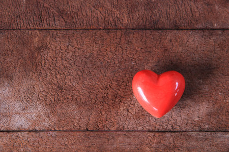 Red valentine heart wood background