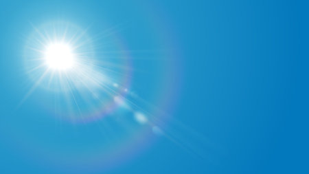 Sun and sunlight flare in blue sky. Sunshine with lens effect. Solar ray summer background, bright warm halo with optical beam. Sunrise glow, fantasy magic and realistic sparkle vector illustrationのイラスト素材