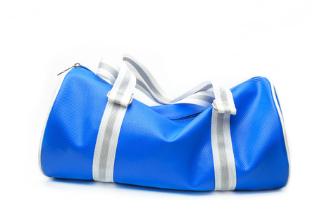 Coles up of blue bag on white background.の写真素材
