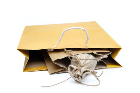 Sack in small bag and big bag on white background.の写真素材