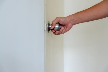 Closeup hand opening the door.の写真素材