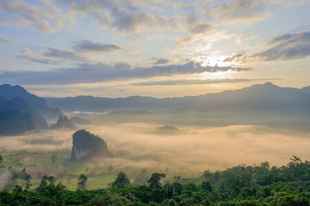 Beautiful sunrise on mountain which the mist cover all area at Phayao province, Thailand