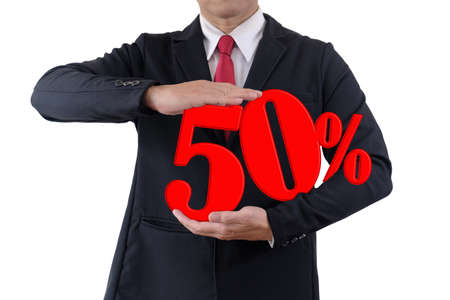 Businessman holds number tell discount fifty percent on white backgroundの写真素材