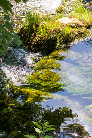 Dovedale-Flowing water over stones in a nature reserve in England