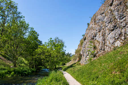Dove Dale - beautiful view among the green trees on a sunny day