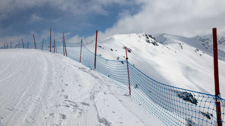 Landscape in the Polish Tatra Mountains. View of the snow-capped peaks in April.の写真素材